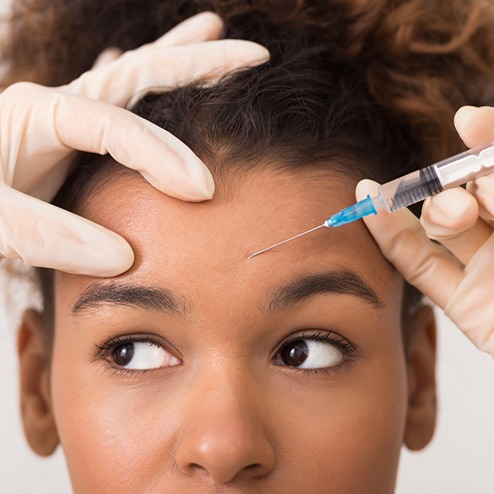 Curious person getting an injection